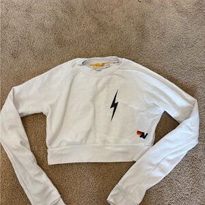 Aviator Nation White Cropped Sweatshirt with Black Lightning Bolt